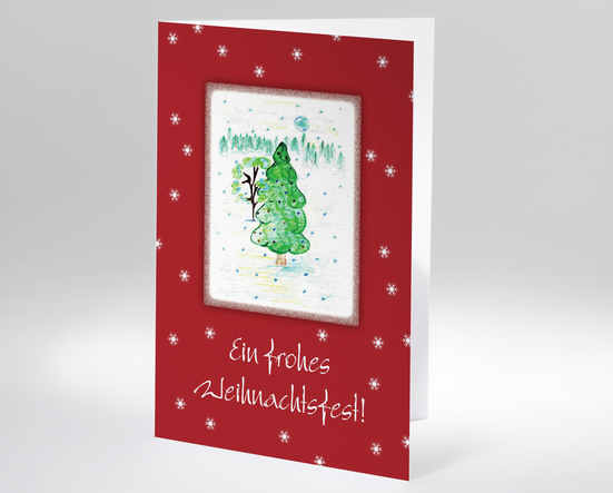 Leuchtender Weihnachtsbaum im Schnee