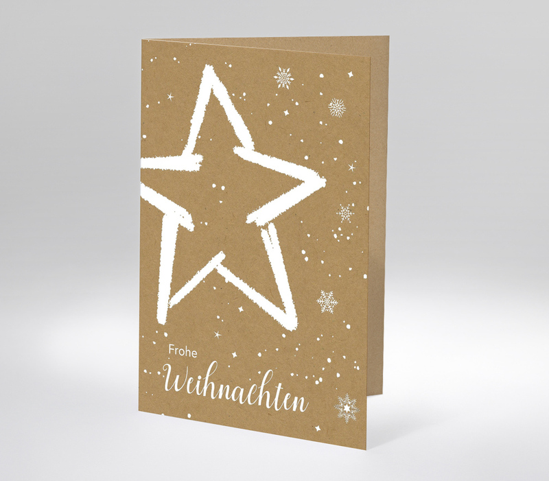 Weihnachtskarte mit weißem Stern und Schneeflocken auf braunem Hintergrund