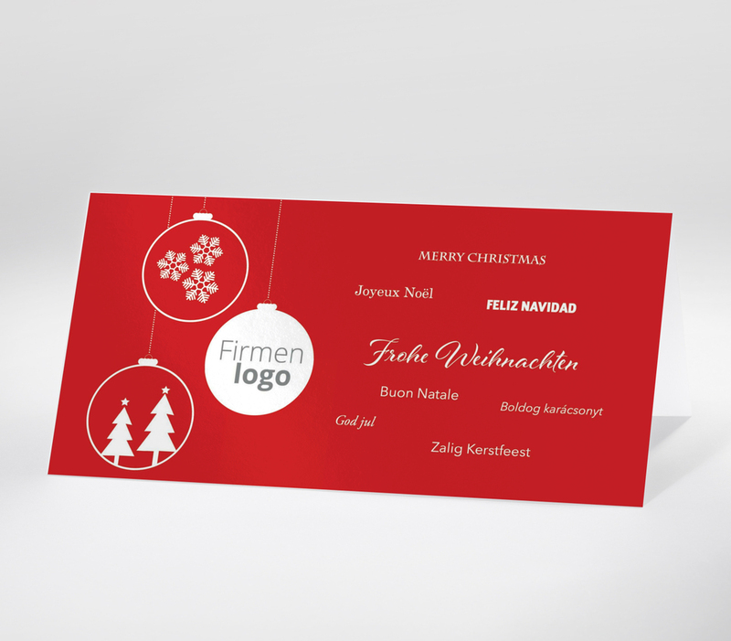 Internationale Weihnachtskarte mit Frohe Weihnachten in mehreren Sprachen auf rotem Hintergrund