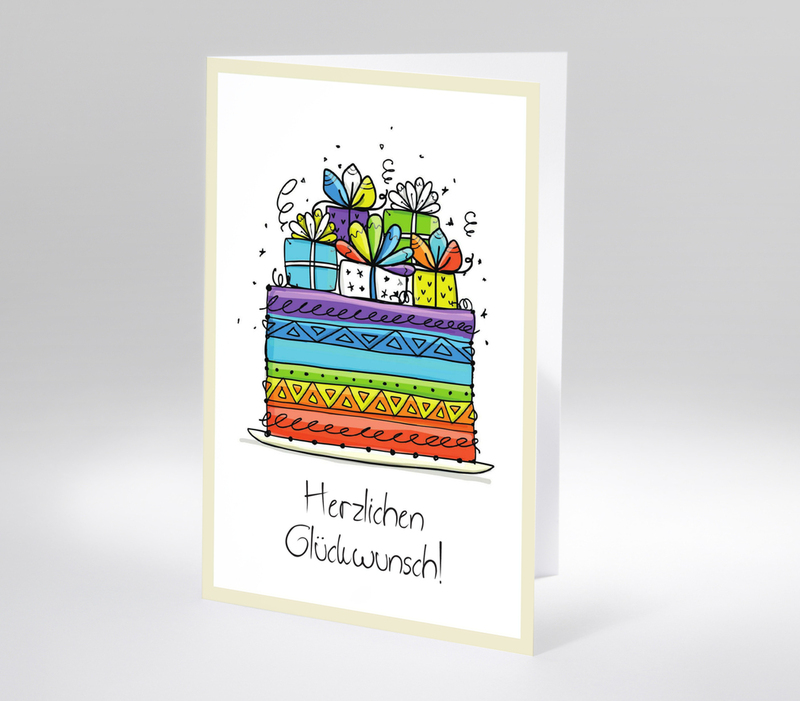 Geburtstagskarte mit bunter Torte aus Geschenken und handschriftlichem Text Herzlichen Glückwunsch