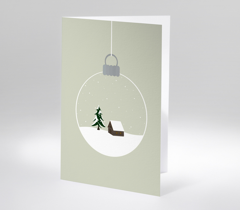 Schlichte Weihnachtskarte mit Hütte und Tannenbaum in einer durchsichtigen Christbaumkugel