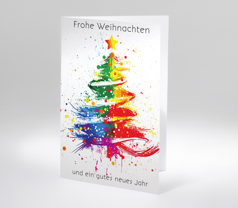 Bunte Weihnachtskarte mit stilisiertem Weihnachtsbaum aus Farbklecksen und Schrift Frohe Weihnachten und ein gutes neues Jahr