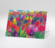 Farbenfrohes Pastellbild mit Tulpen in allen Farben